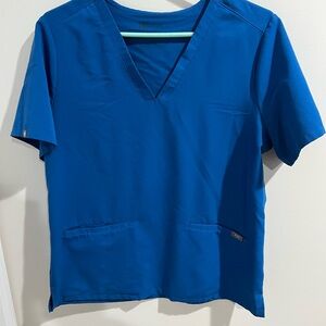 Figs: Blue V-Neck Scrub Top and Kade cargo pants